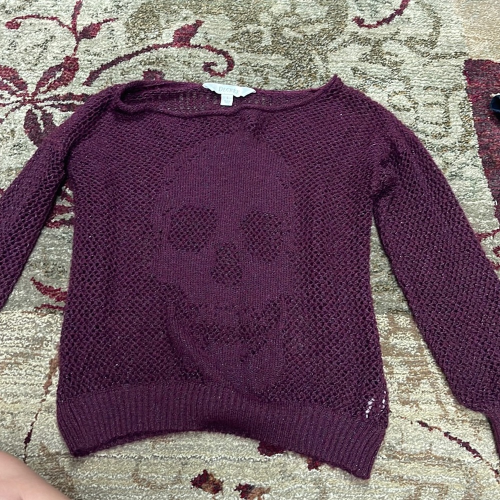 never worn, see through sweater
